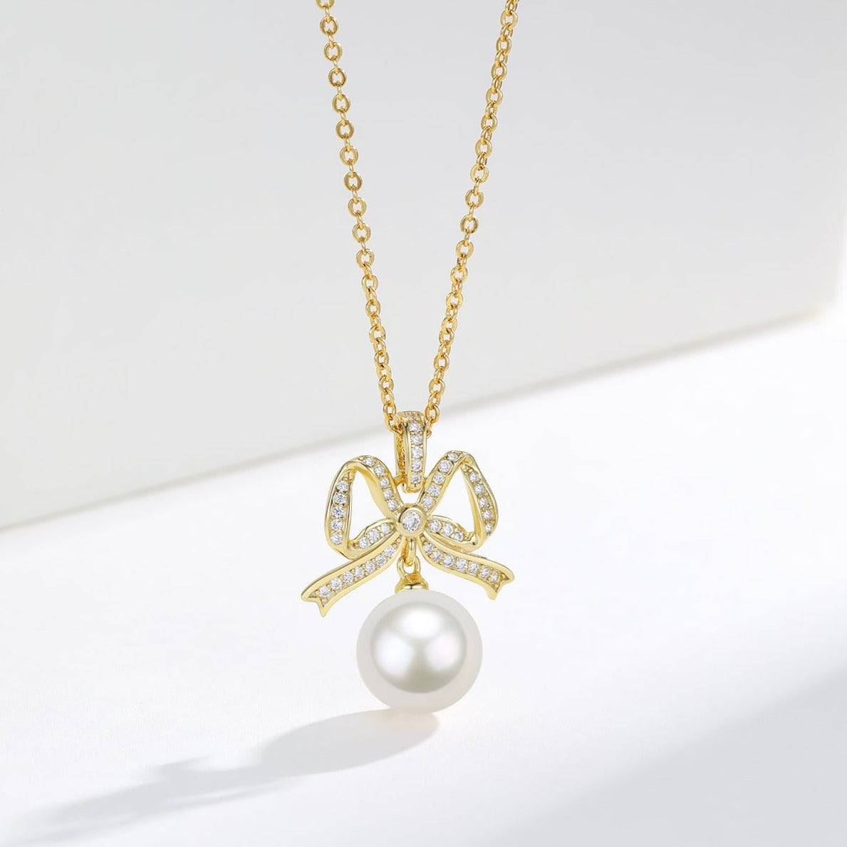 10-11mm Freshwater Pearl CZ Bowknot Pendant Necklace