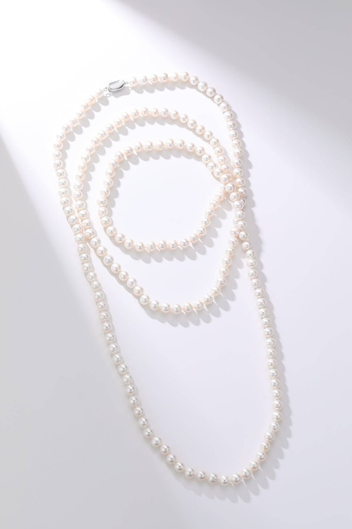 52-inch White Freshwater Pearl Rope Strand - AAA Grade