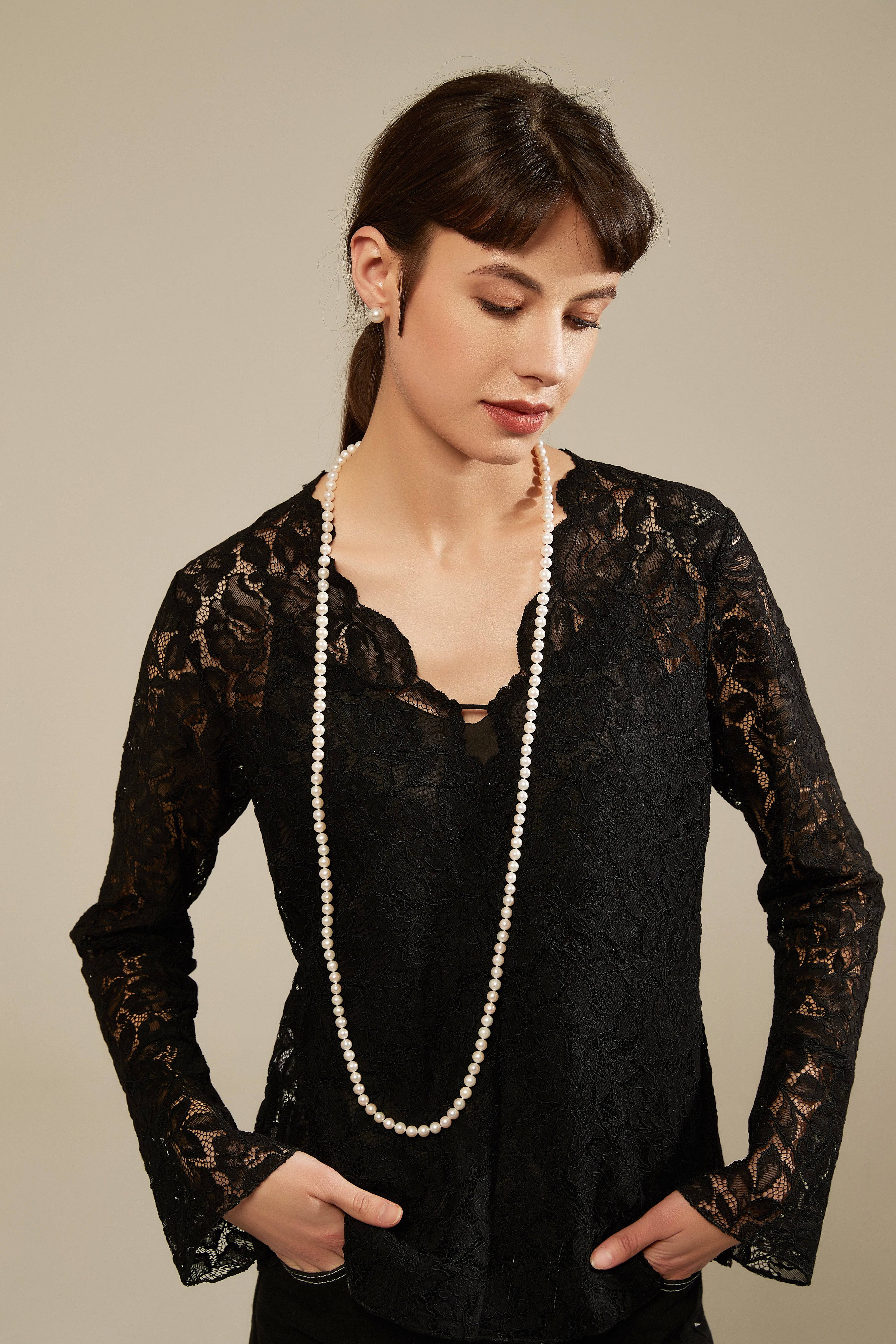 52-inch White Freshwater Pearl Rope Strand - AAA Grade